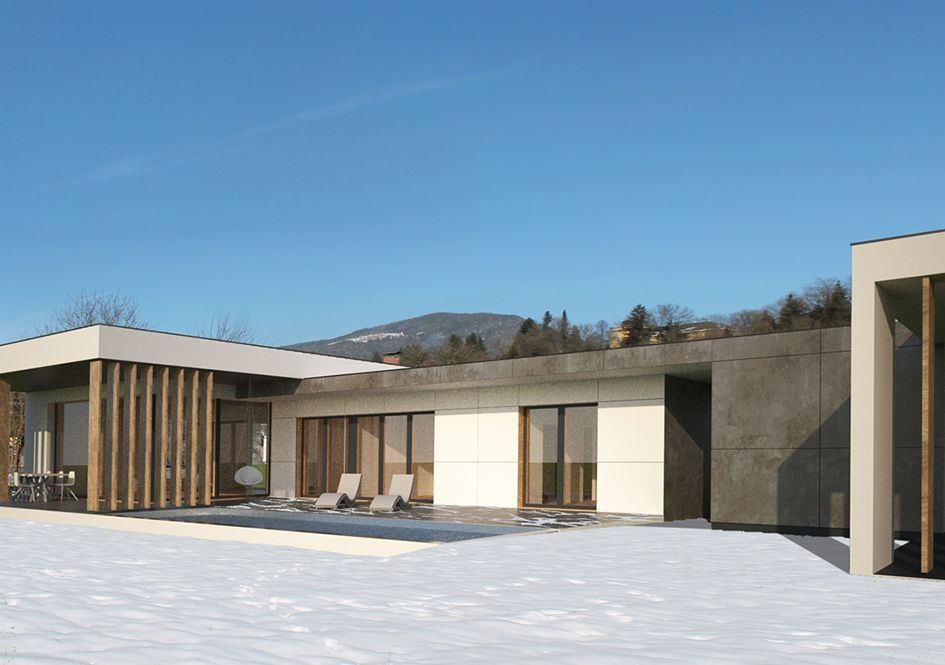 Moderner Bungalow mit Flachdach im Winter