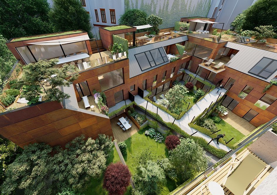 Begrünter Innenhof mit moderner Wohnanlage und Garten