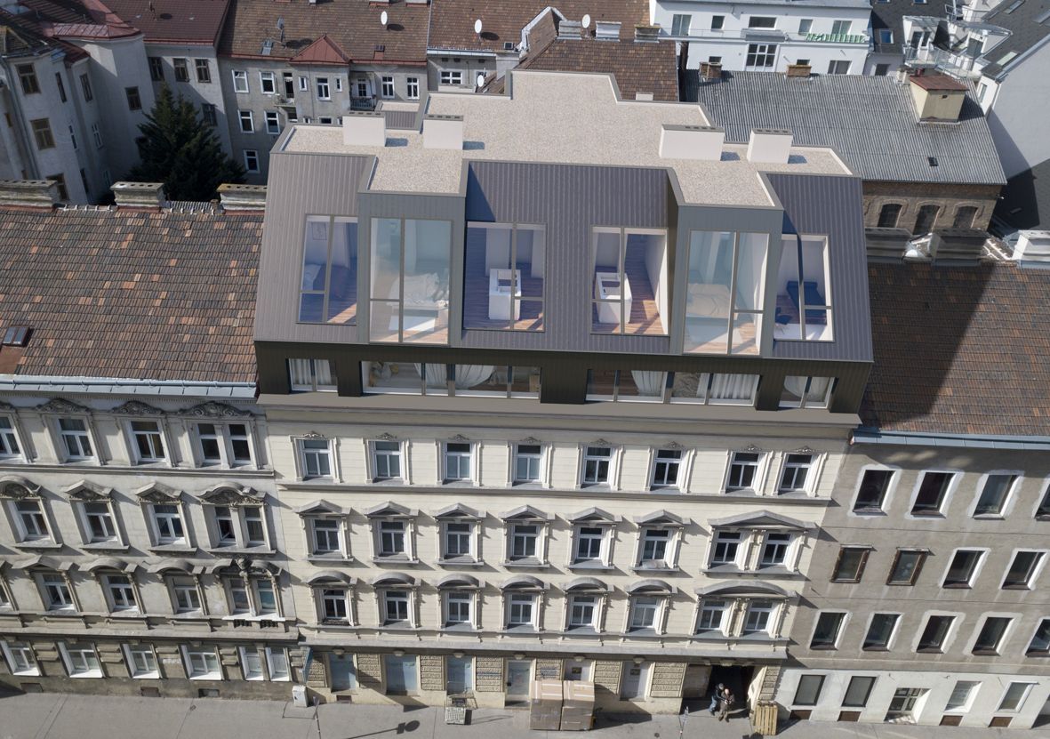 Altbau mit modernem Dachgeschossausbau und großen Gauben