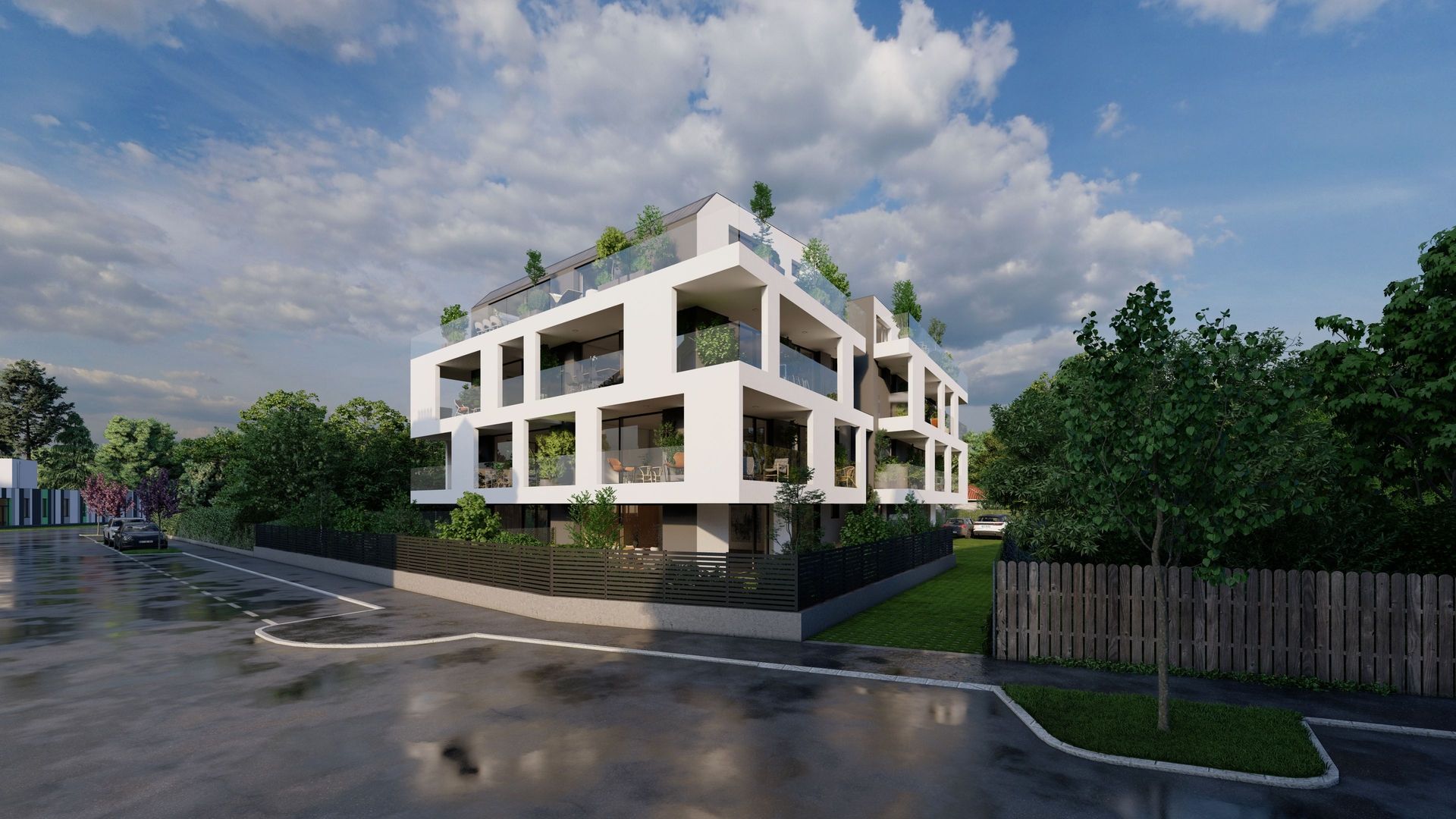 Modernes Mehrfamilienhaus mit begrünten Balkonen