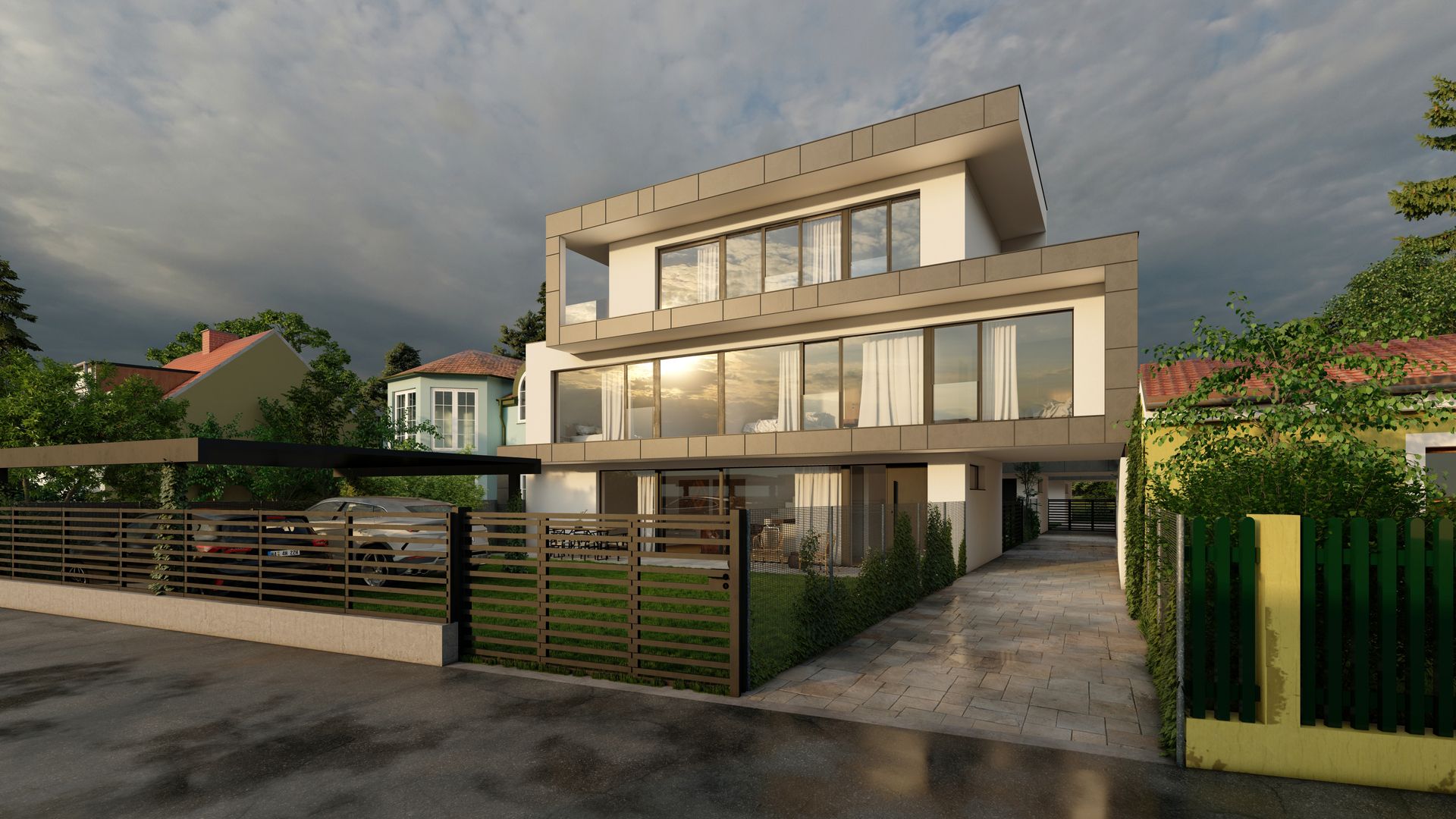 Mehrfamilienhaus mit Glasfassade und Einfahrt