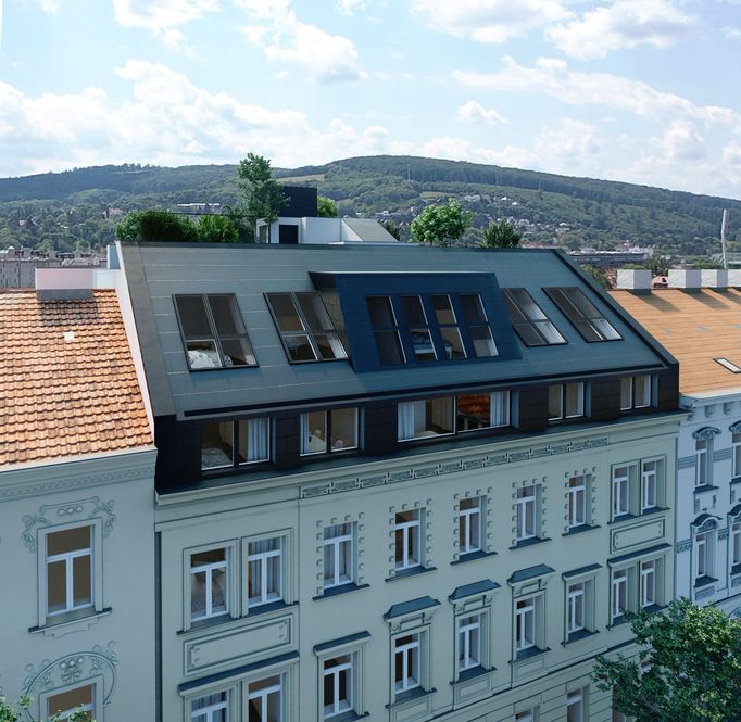 Sanierter Altbau mit neuem Dachgeschoss in der Stadt